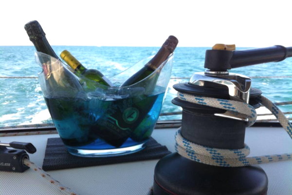 Champagne on board in a sailing tour
