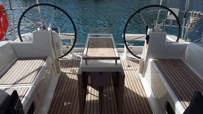 View to the back, deck table and cockpit of the sailing boat