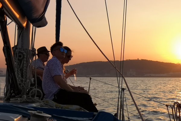 Sailing at the sunset in Barcelona