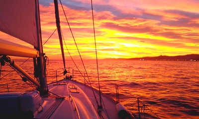 Amazing spectrum of colours at the sunset sailing from Costa Brava to Barcelona