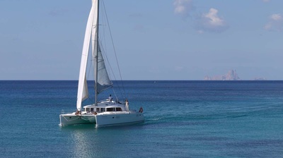 The catamaran sailing in Ibiza