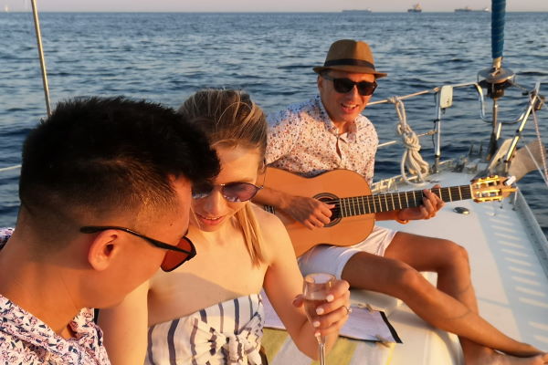 Live music on the sailing boat at sunset